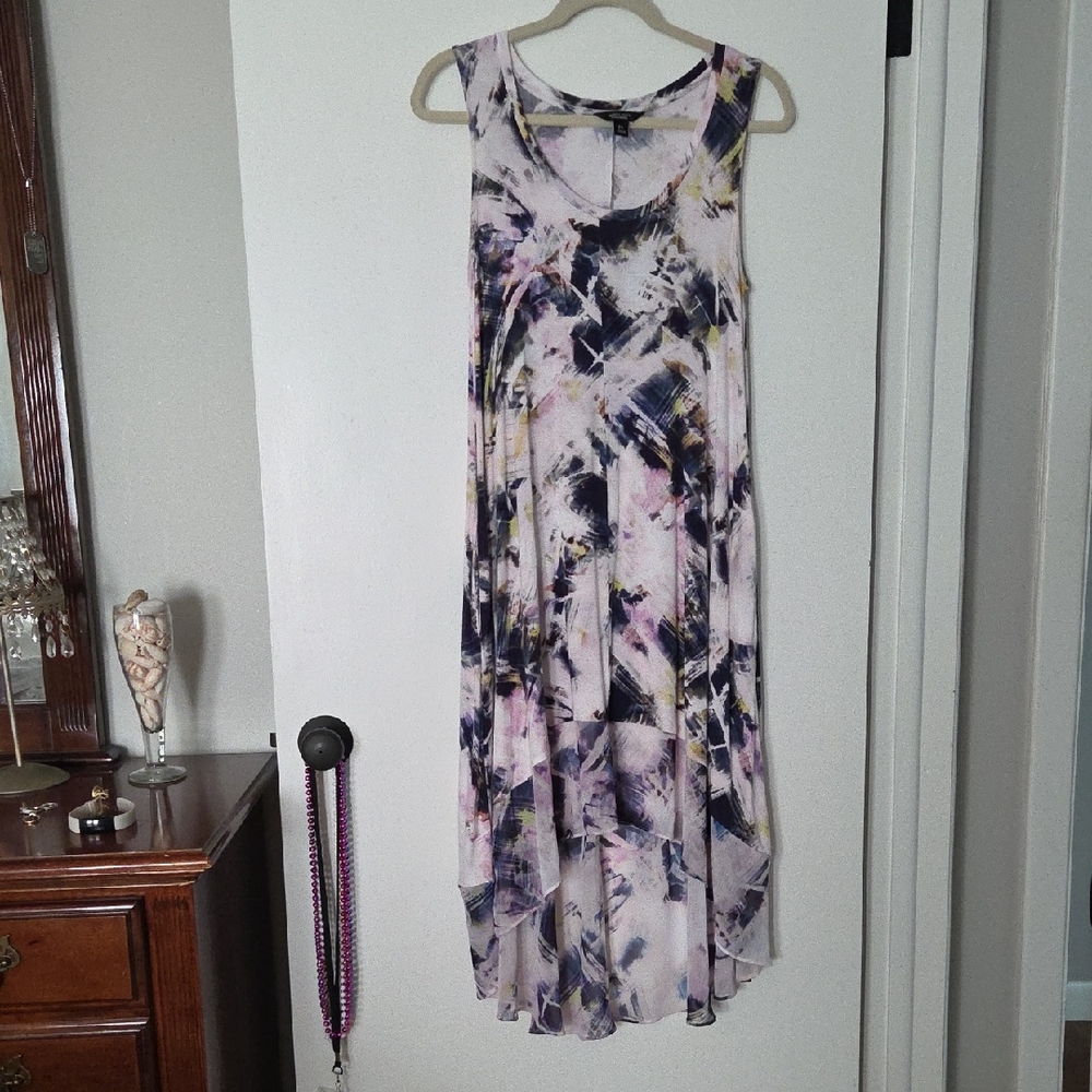 Abstract Print Sleeveless Dress With Pockets.